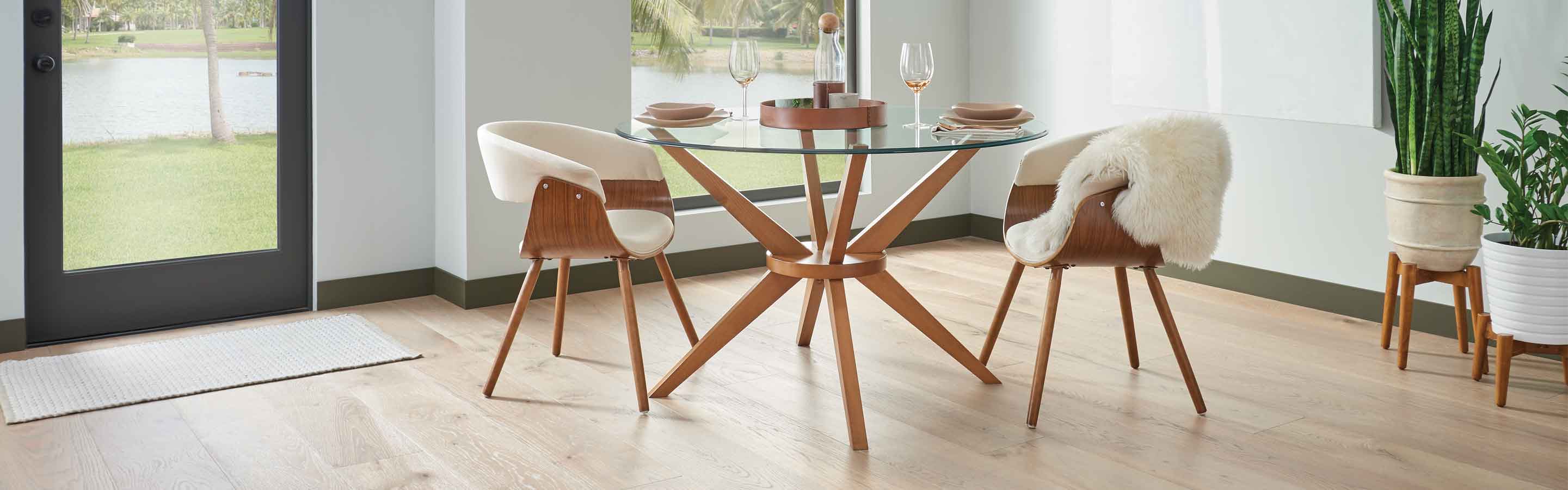 light hardwood flooring in dining room