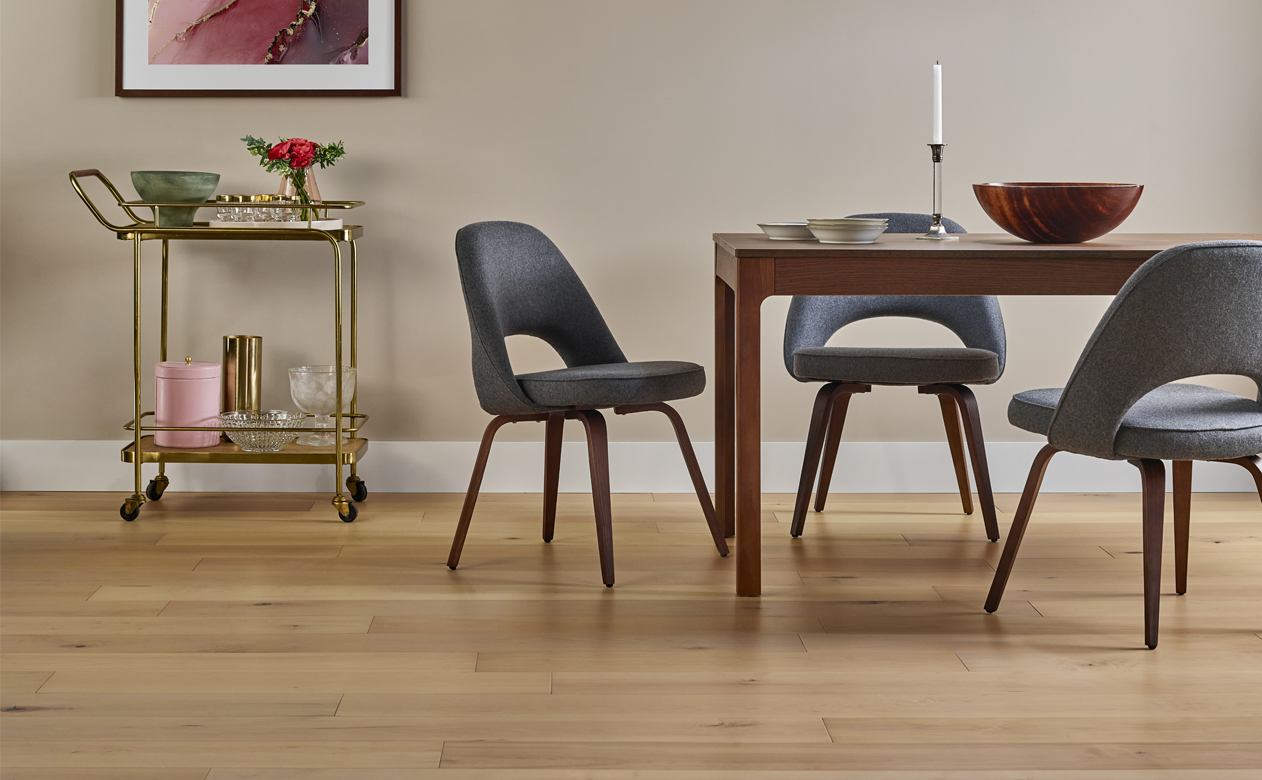 light hardwood flooring in dining room